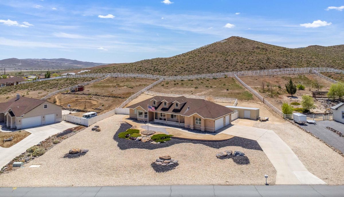 Aerial of a ranch home on a large lot